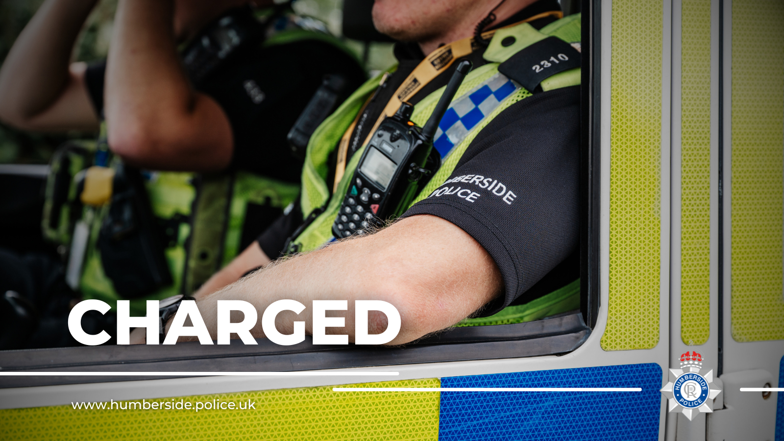 Close up images of officers inside police van
