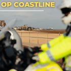 Image of officer on motorbike with Cleethorpes beach in background