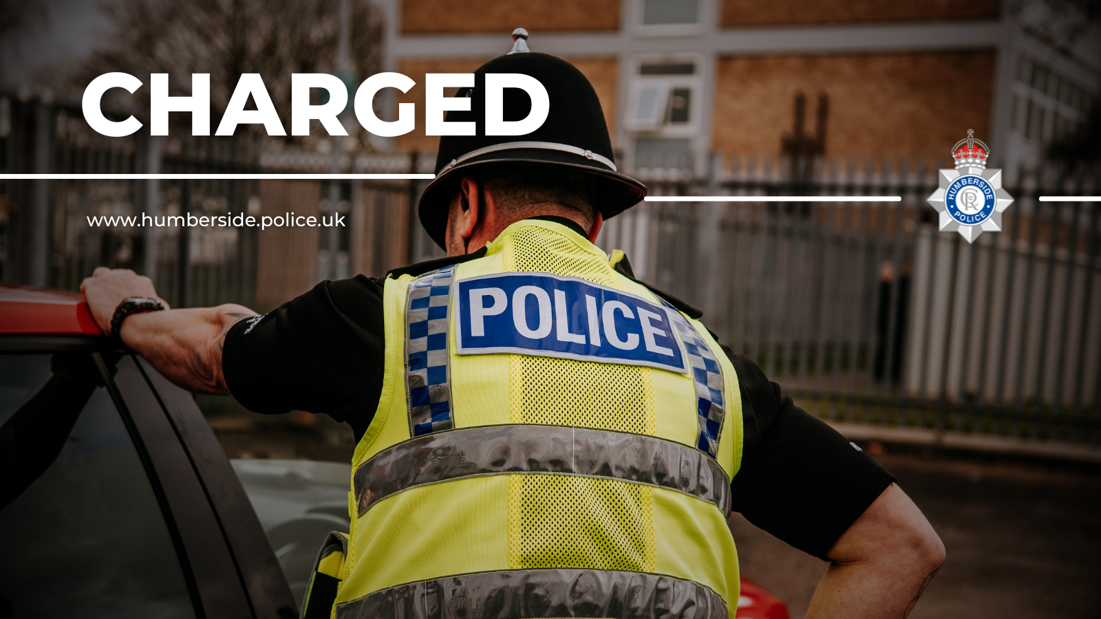 Image of police officer waiting for suspect in car