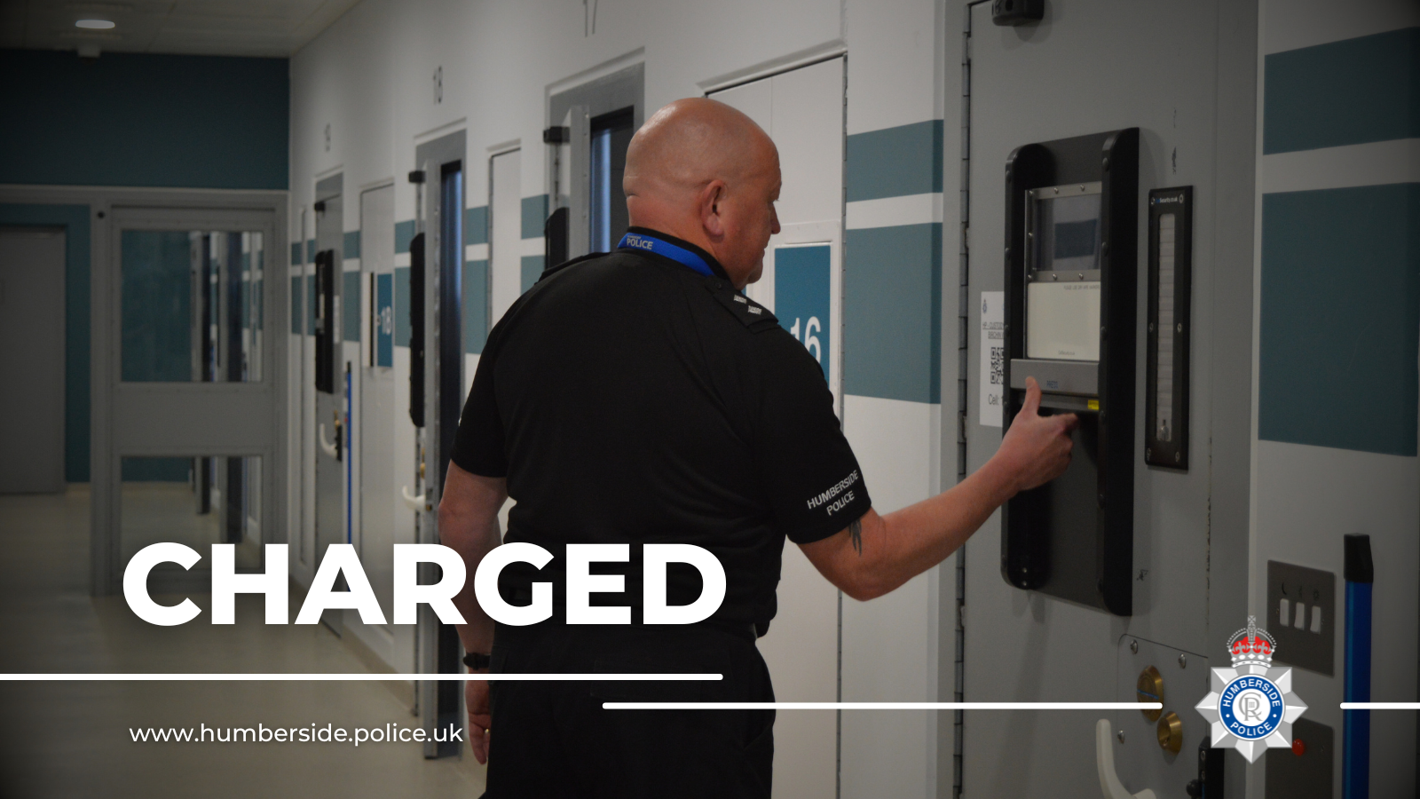 Image of detention officer checking cell