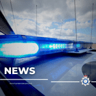Blue lights on the top of a police car 