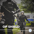 Op Shield officers running into building to conduct warrant