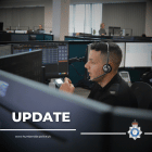 Picture of a contact officer taking a call with the word update written in white
