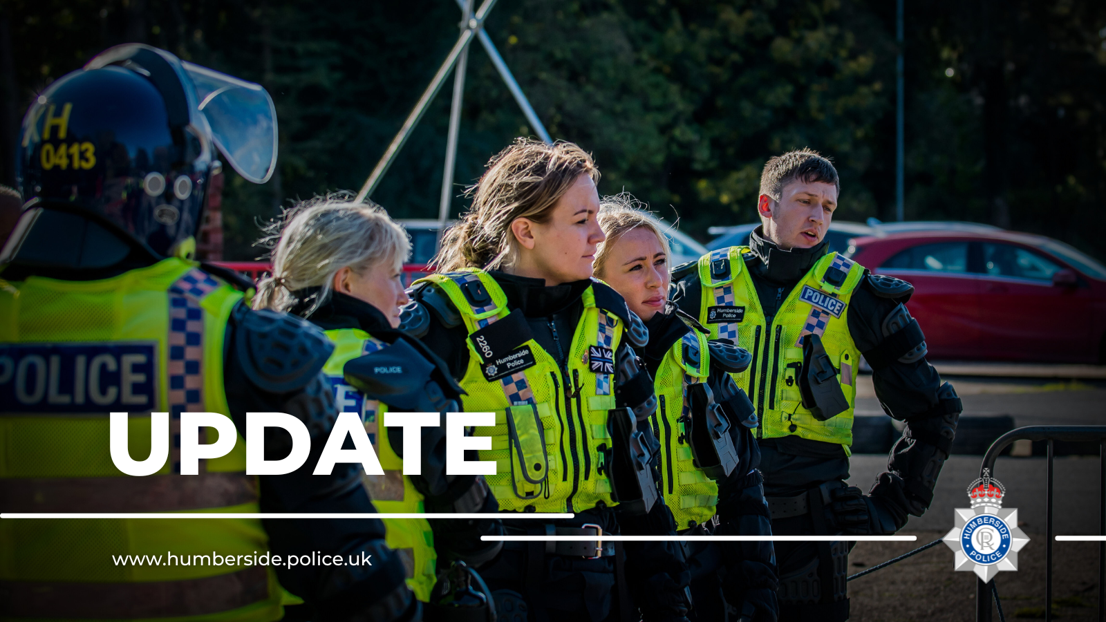 Image of officers with the words 'update' overlaid