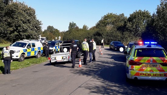 Photo showing police vehicles doing roadside check points