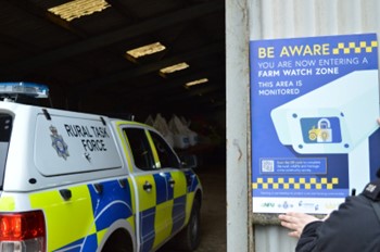 Photo showing Rural Task Force vehicle in barn doorway