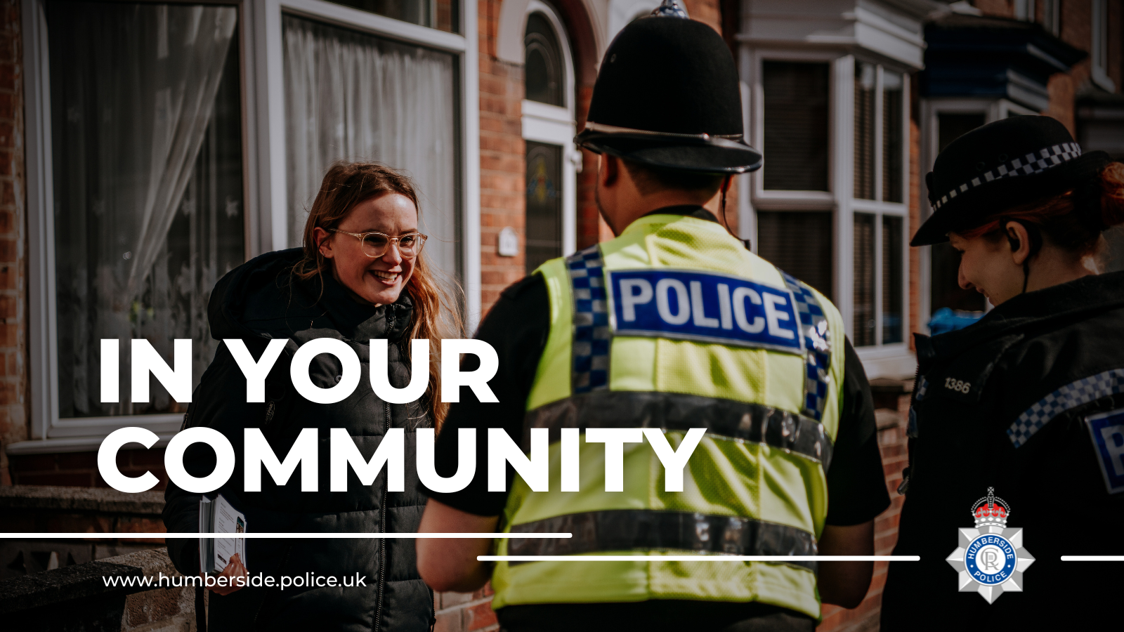 Image of officer engaging with community 