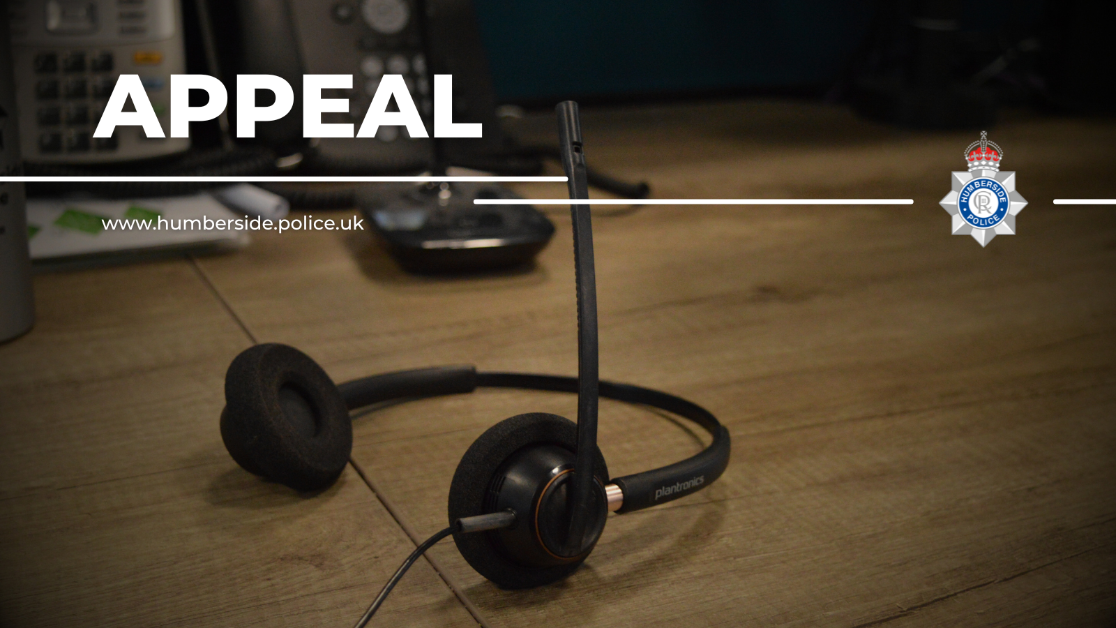 Image of call handler headphones on desk in the force control room