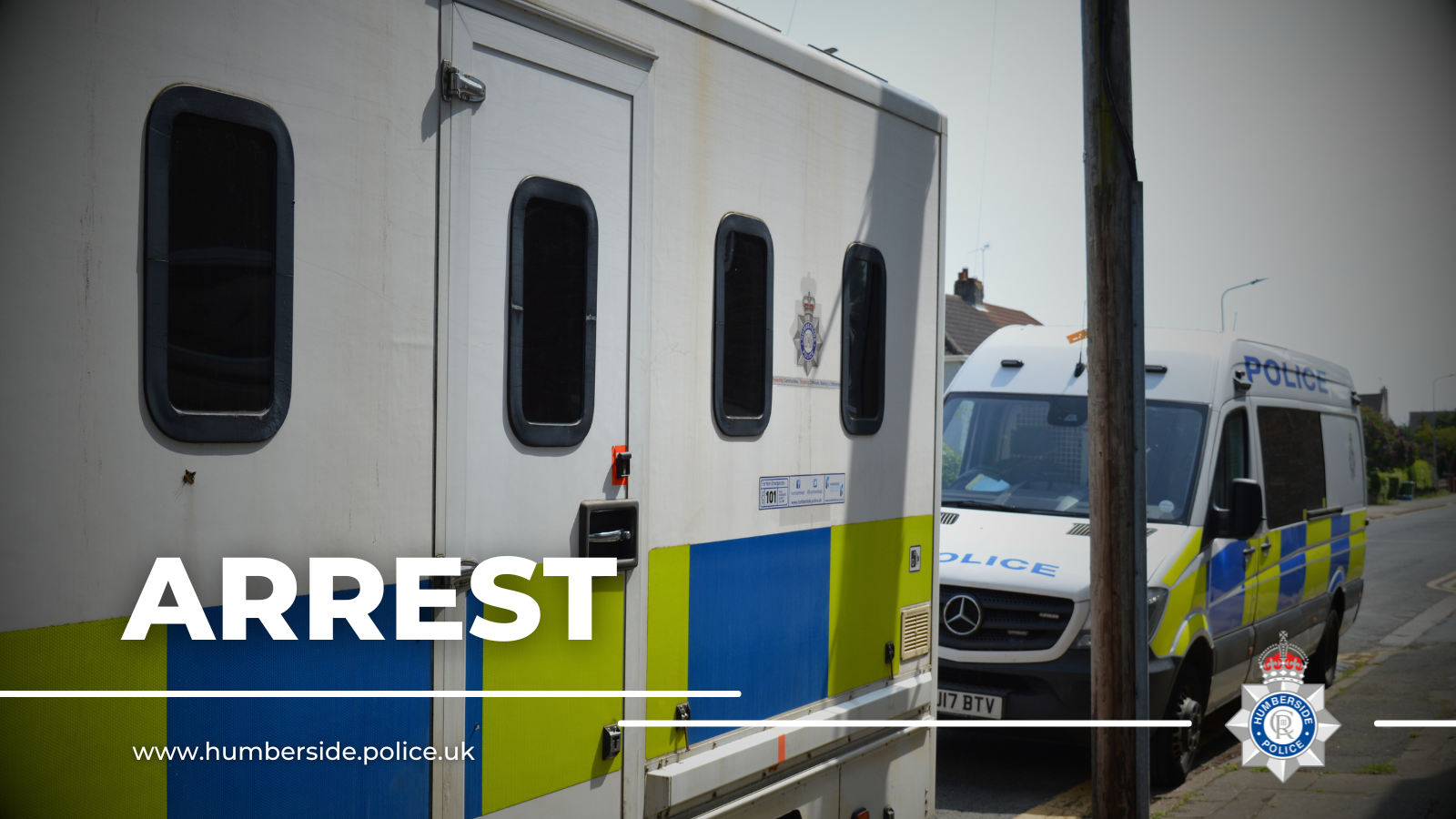 Image of prison van and police van