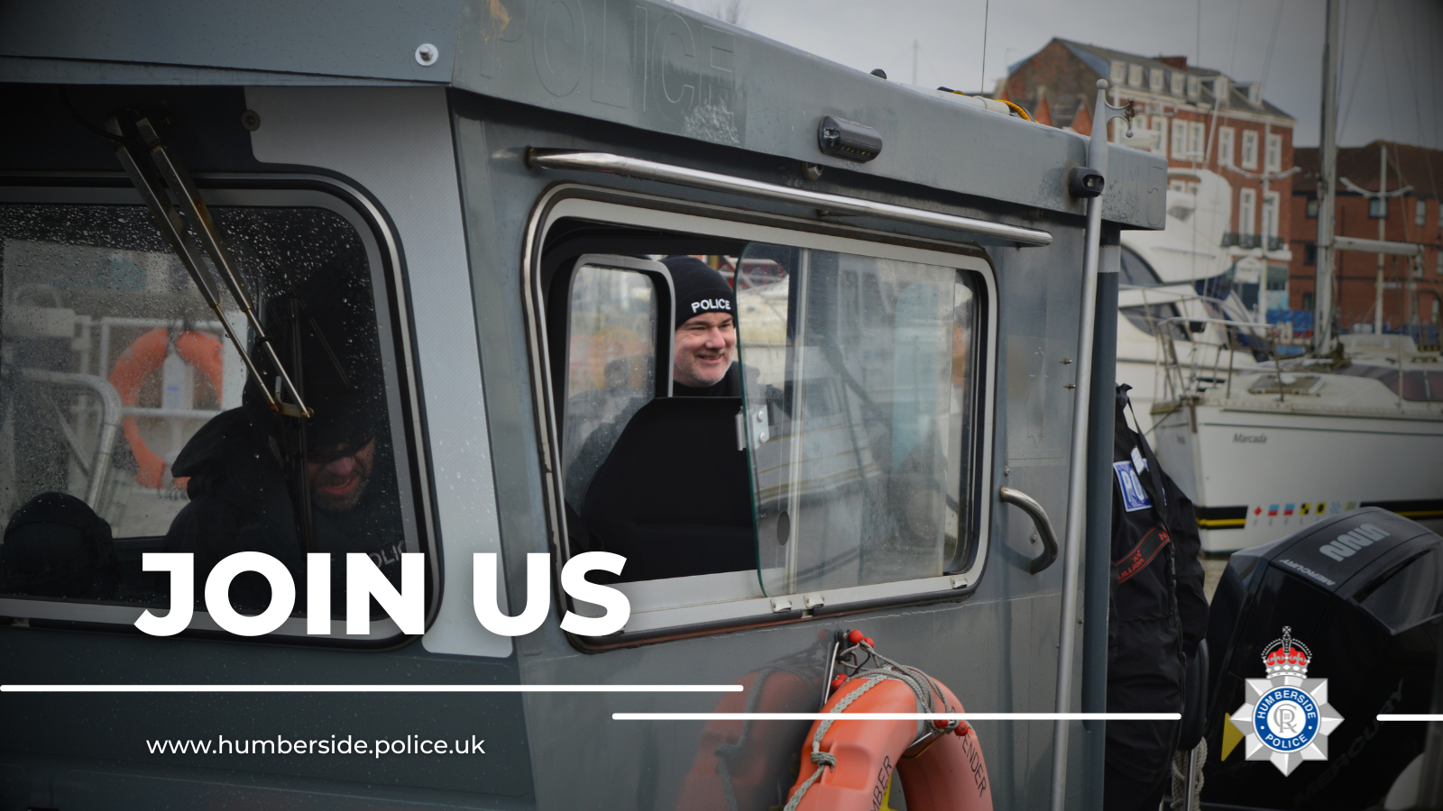 Image of officers on one of our police boats