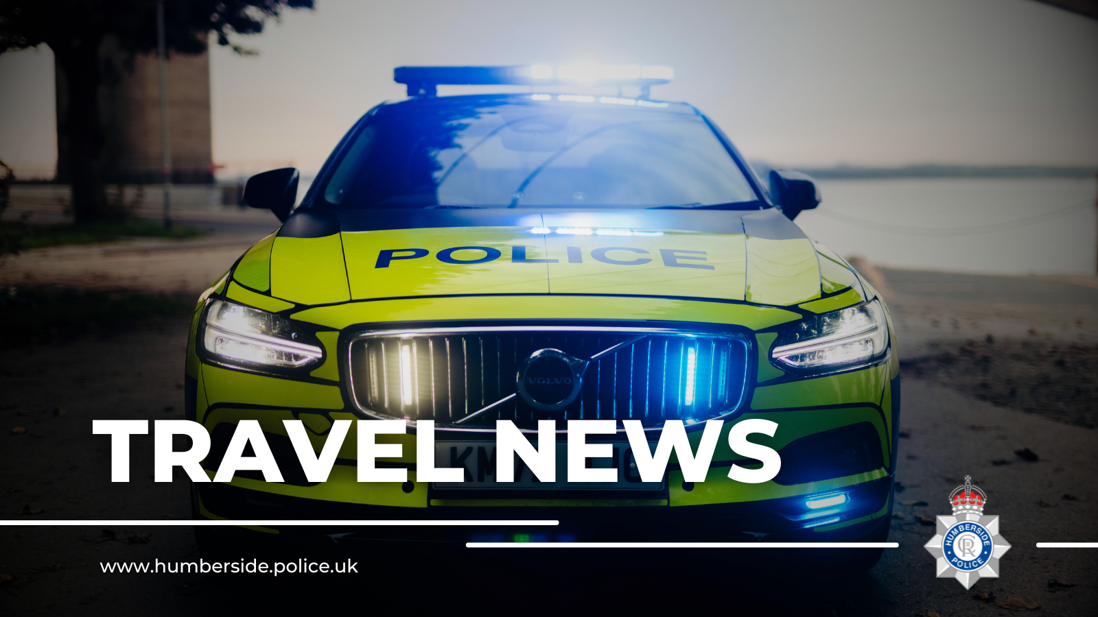 Close up of police car with Humber Bridge backdrop